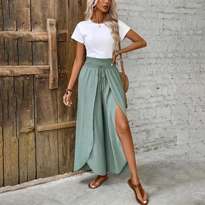 Detail of high waist drawstring sage green wide leg pants with side slit design