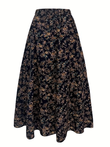 Detail of floral printed pleated midi skirt with elastic waist and A-line silhouette