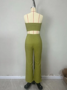 Rear view of olive green tube top and flared trousers set with vertical pleated texture