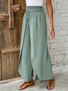 Women's light green wide leg pants with high waist drawstring and front slit design
