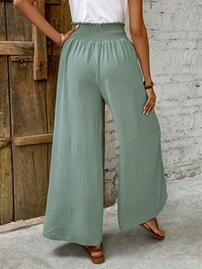 Sage green high-waist wide-leg trousers with elastic waist and vertical texture back view