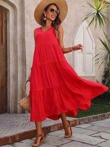 Close-up of elegant red V-neck sleeveless tiered midi dress for summer vacation