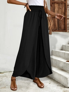 Detail view of black high waist petal hem wide leg pants with elastic drawstring waist