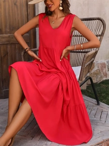 Detailed view of red sleeveless tiered cake dress with V-neck and ruffled hem design