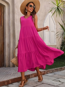 Detail of fuchsia V-neck tiered maxi dress featuring lightweight layered skirt panels