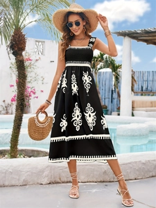 Detail of square neck and ethnic geometric print on black and white midi dress