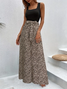 Women's two-piece set featuring black tank top and high-waist leopard print wide leg pants