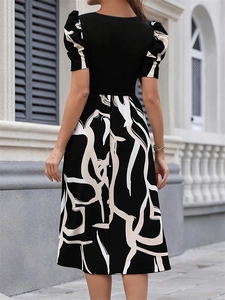 Slim fit puff sleeve knit dress with abstract print and square neck back view