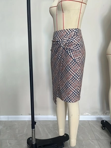 Elegant houndstooth pencil skirt with twist front detail and asymmetrical hem for women