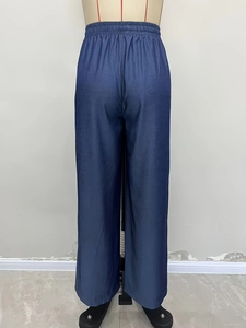 High-waisted wide leg trousers in deep blue with elastic drawstring waist and relaxed fit