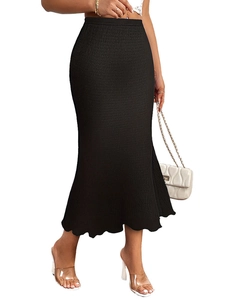 Detail of elegant black pleated mermaid skirt featuring vertical texture and ruffled hem