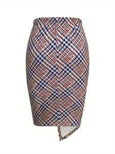 Detail of tricolor houndstooth pattern fabric with asymmetric hem on pencil skirt