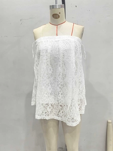 Elegant white floral lace strapless top for women shown on a professional dress form