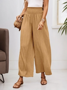 Women's khaki high-waisted wide-leg pleated trousers with elastic smocked waist detail
