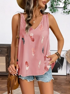 Detail of V-neck sleeveless top with pink feather prints and delicate lace patchwork