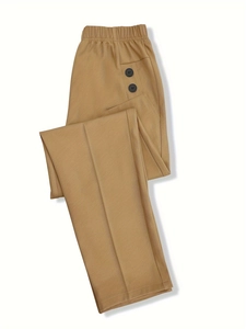 Close-up of khaki straight trousers featuring elastic waistband and black decorative buttons