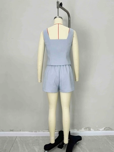 Back view of a light blue two-piece set featuring sleeveless top and high-waist shorts