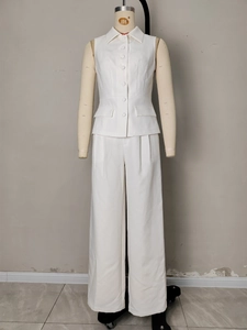 Elegant white two-piece suit set with sleeveless lapel vest and high-waist wide-leg trousers