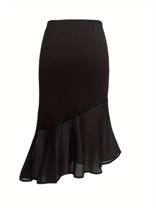Detail view of high waist black midi skirt showing mesh fishtail hem and diagonal seams