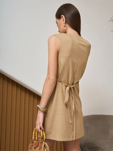 Sleeveless khaki mini dress with vertical stripes and waist tie for a stylish summer look