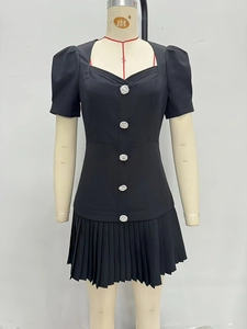 French vintage little black dress with puff sleeves and silver decorative buttons