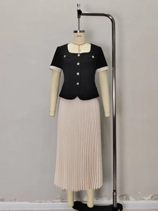 Elegant black short sleeve top with gold buttons and beige pleated chiffon skirt set