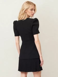 French vintage style slim fit black mini dress with puff sleeves and pleated hem