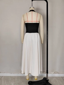 Élégante robe longue dos nu avec haut noir et jupe blanche fluide contrastée