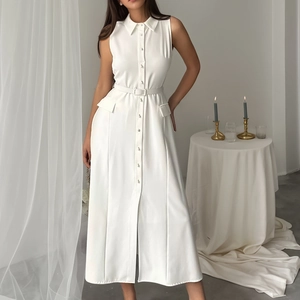 Elegant sleeveless white dress featuring a lapel collar, pearl buttons, and slim waist belt