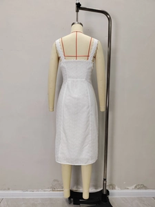 White lace embroidered midi dress with slim shoulder straps and smocked back design