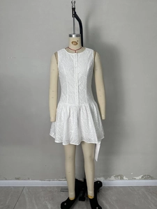 White sleeveless eyelet embroidery mini dress with front buttons and ruffle hem
