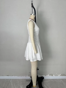 Sleeveless white eyelet lace mini dress featuring a button-down slim fit silhouette