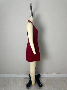 Sleeveless burgundy halter mini dress with starfish applique on professional mannequin