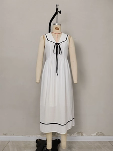 Slim white sleeveless sailor collar maxi dress with black ribbon bow and stripe details