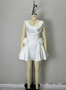 Detail view of the elegant white satin cowl neck and 3D rose flower decorations on dress