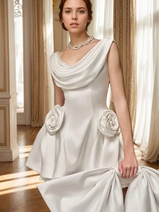 Elegant white satin mini dress featuring 3D rose details and cowl neck styling
