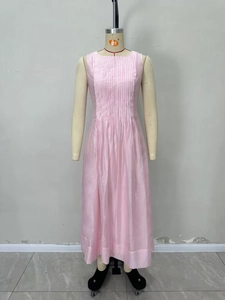 Pink sleeveless long dress with pleated chest design and flowing maxi skirt for women