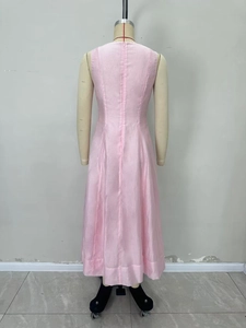 Pink sleeveless long dress for women featuring a cinched waist and back zipper