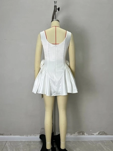 White sleeveless satin mini dress with pleated skirt and back zipper closure