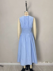 Elegant light blue sleeveless midi dress with elastic smocked waist and A-line silhouette
