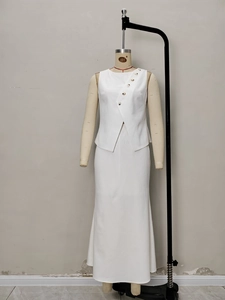 Sleeveless white top and long fishtail skirt set for an elegant formal feminine look