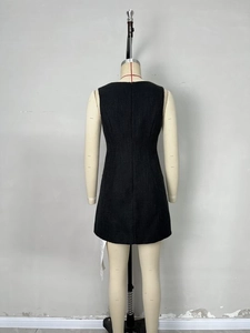 Elegant black sleeveless A-line mini dress with tweed texture and back zipper