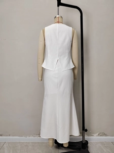 Elegant two-piece white sleeveless top and long skirt formal set for women