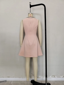 Pink sleeveless A-line dress with sparkling rhinestone collar and back zip closure