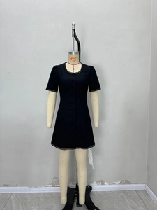 Elegant black short sleeve mini dress with square neck and lace trim detailing