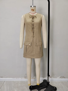 Chic khaki sleeveless utility dress with bow neckline and cargo pockets on mannequin