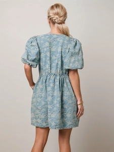 Elegant light blue puff sleeve dress with floral pattern and elastic waist, back view design