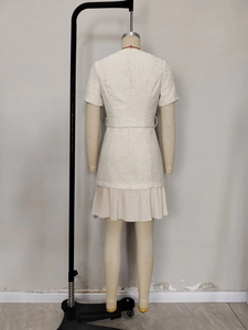 French vintage apricot tweed short sleeve pleated dress with waist belt back view