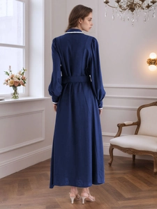 Elegant navy blue shirt dress with balloon sleeves and contrast scalloped trim details