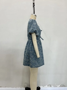 Elegant denim blue puff sleeve floral mini dress with drawstring waist and bow detail